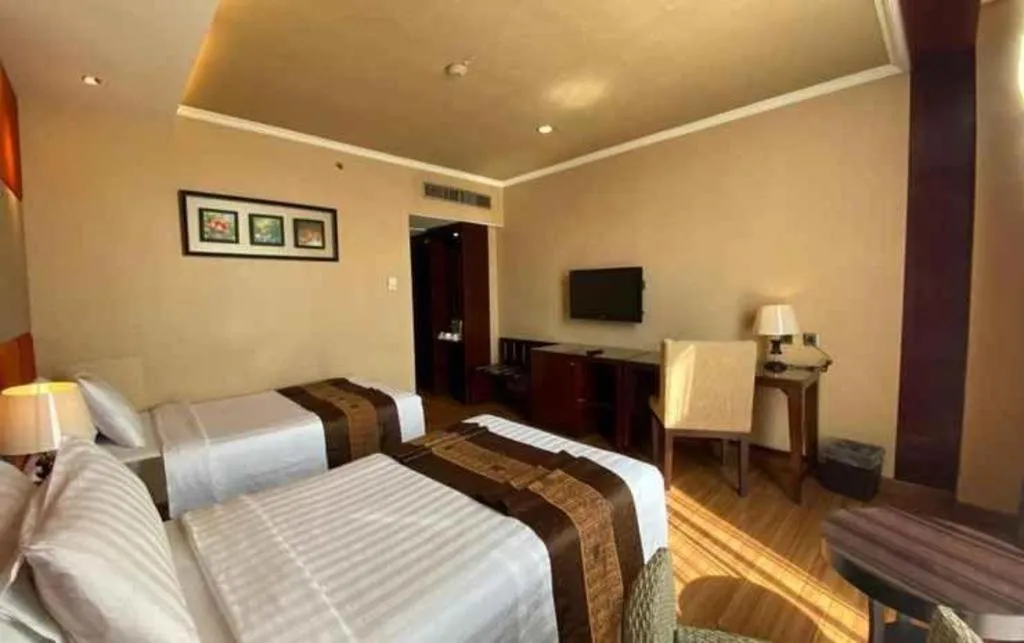 Bed in Regent's Park Hotel at Kayutangan Malang