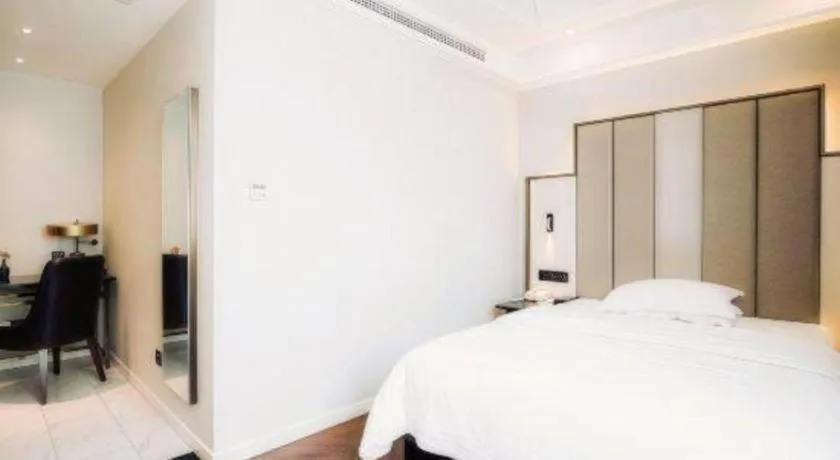 Bed in Jinjiang Metropolo Hotel Nanjing Jiangning Binjiang Development Zone