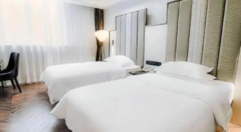 Bed in Jinjiang Metropolo Hotel Nanjing Jiangning Binjiang Development Zone