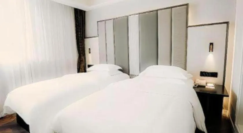 Bed in Jinjiang Metropolo Hotel Nanjing Jiangning Binjiang Development Zone