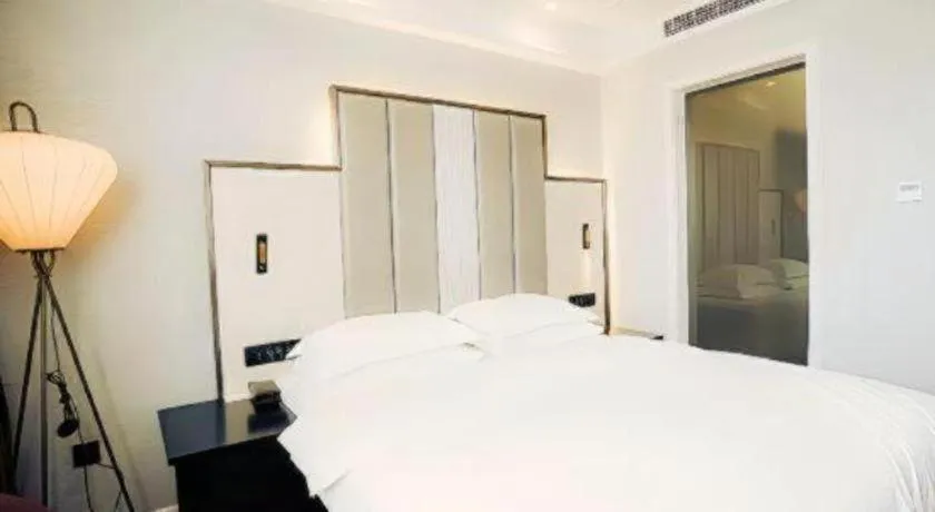 Bed in Jinjiang Metropolo Hotel Nanjing Jiangning Binjiang Development Zone