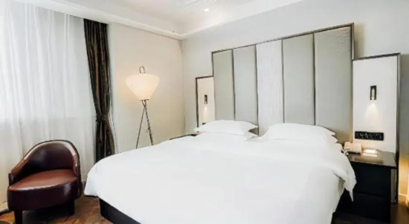 Bed in Jinjiang Metropolo Hotel Nanjing Jiangning Binjiang Development Zone