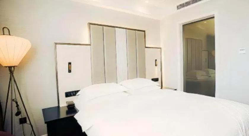 Bed in Jinjiang Metropolo Hotel Nanjing Jiangning Binjiang Development Zone