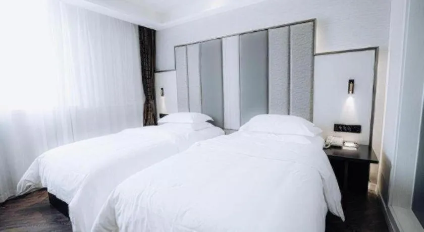 Bed in Jinjiang Metropolo Hotel Nanjing Jiangning Binjiang Development Zone