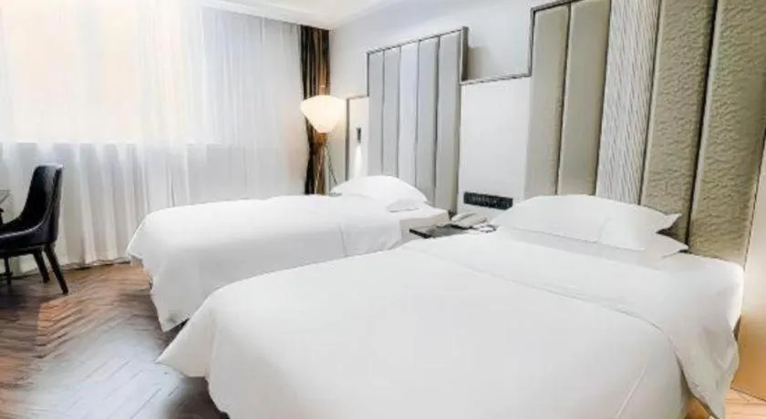 Bed in Jinjiang Metropolo Hotel Nanjing Jiangning Binjiang Development Zone