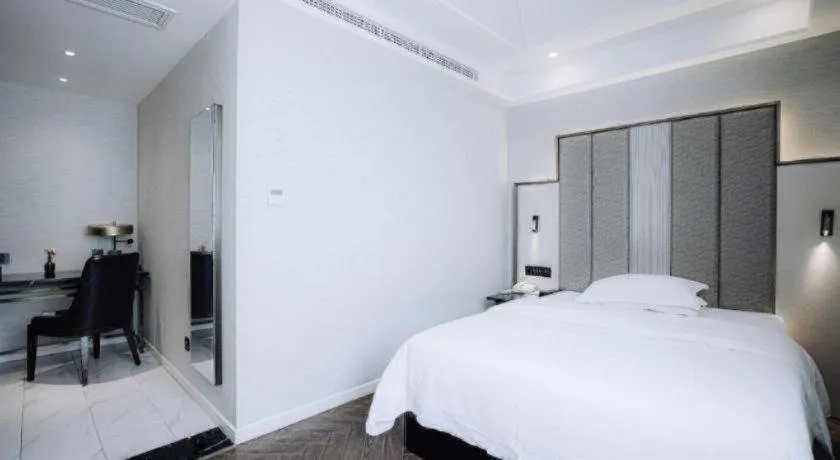 Bed in Jinjiang Metropolo Hotel Nanjing Jiangning Binjiang Development Zone