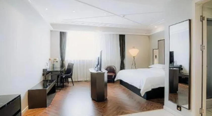 Bed in Jinjiang Metropolo Hotel Nanjing Jiangning Binjiang Development Zone