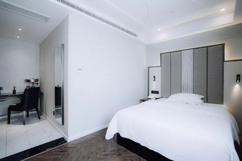 Bed in Jinjiang Metropolo Hotel Nanjing Jiangning Binjiang Development Zone