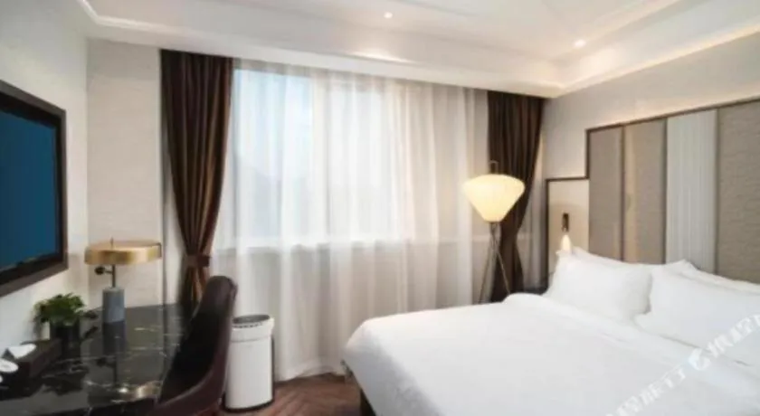 Bed in Jinjiang Metropolo Hotel Nanjing Jiangning Binjiang Development Zone