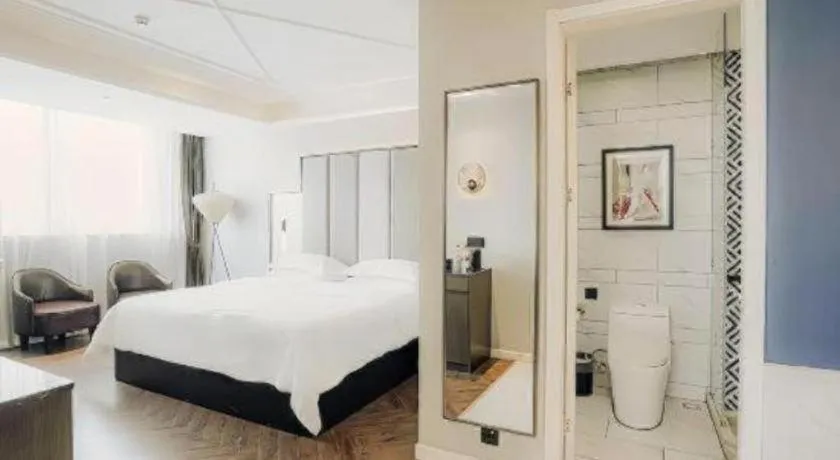 Bed in Jinjiang Metropolo Hotel Nanjing Jiangning Binjiang Development Zone