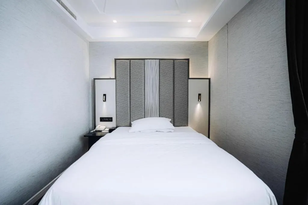 Bed in Jinjiang Metropolo Hotel Nanjing Jiangning Binjiang Development Zone