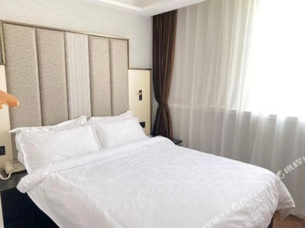 Bed in Jinjiang Metropolo Hotel Nanjing Jiangning Binjiang Development Zone
