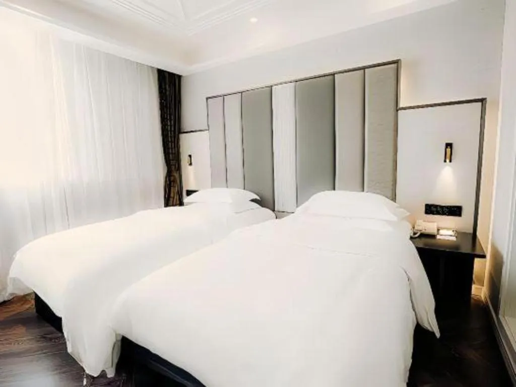 Bed in Jinjiang Metropolo Hotel Nanjing Jiangning Binjiang Development Zone