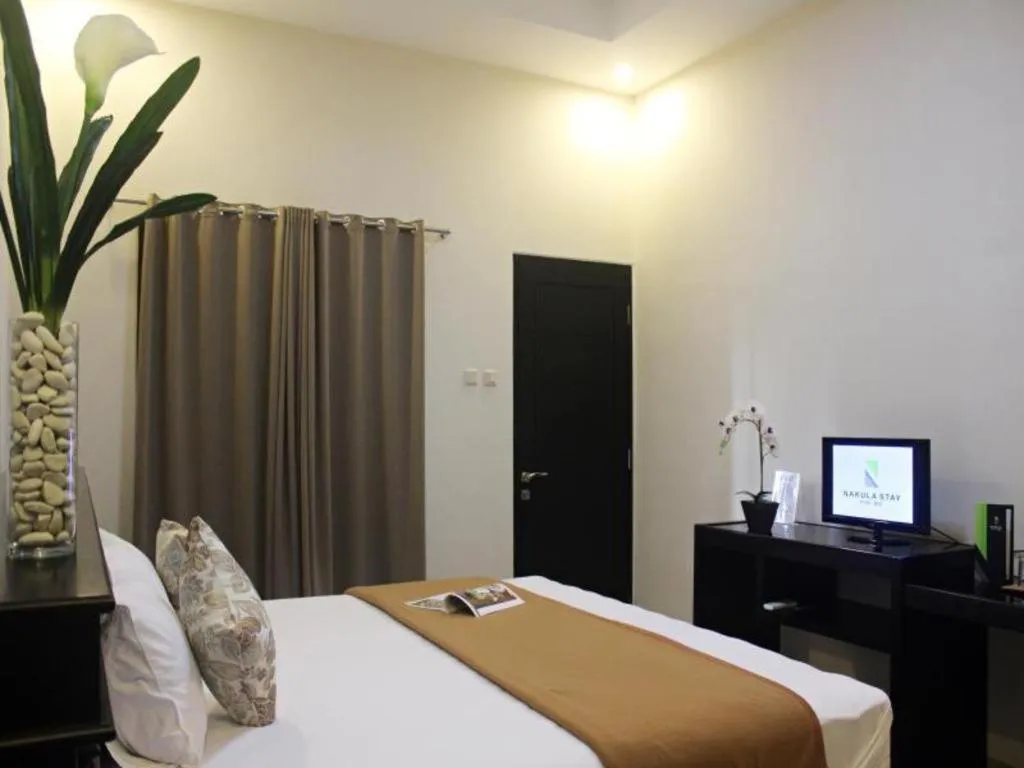Bed in Nakula Stay Kuta