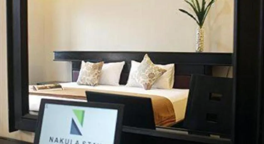 Bed in Nakula Stay Kuta