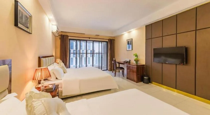 Bed in Foshan Baolong Hotel