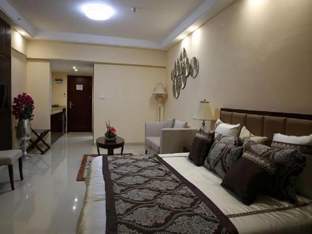 Bed in Foshan Baolong Hotel