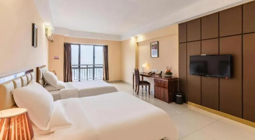 Bed in Foshan Baolong Hotel