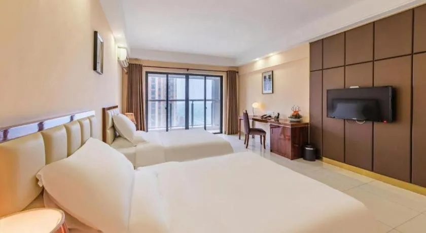 Bed in Foshan Baolong Hotel