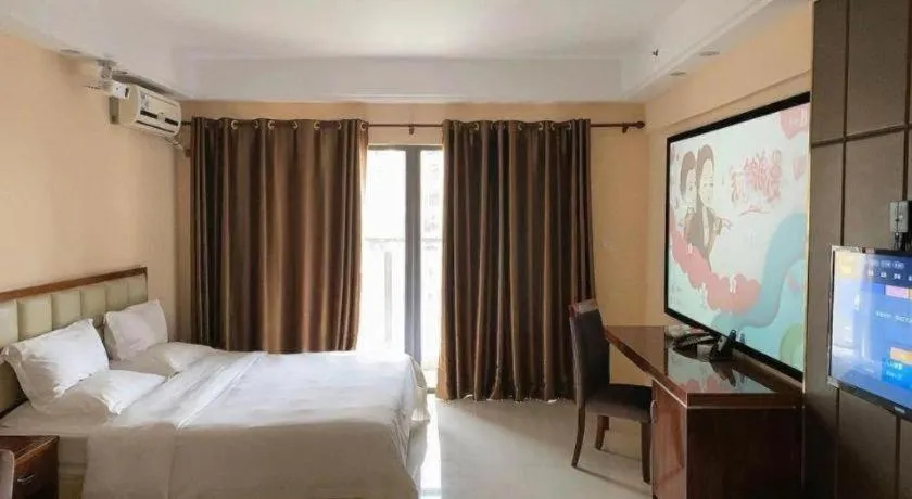 Bed in Foshan Baolong Hotel