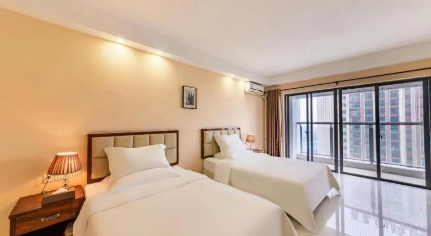 Bed in Foshan Baolong Hotel