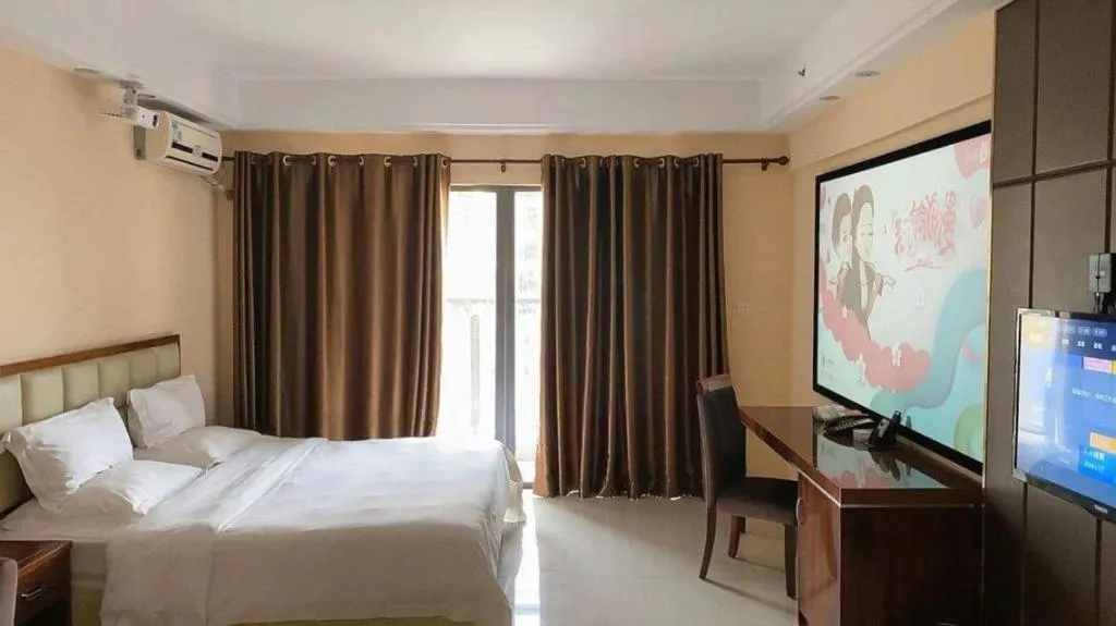 Bed in Foshan Baolong Hotel