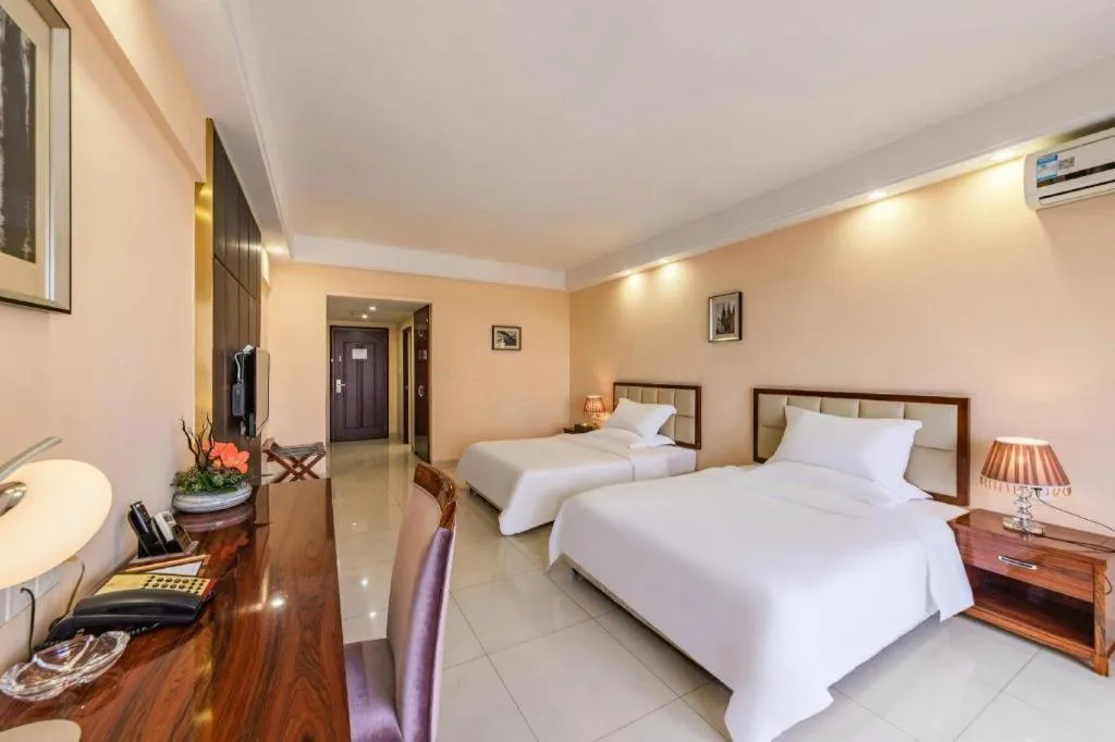 Bed in Foshan Baolong Hotel