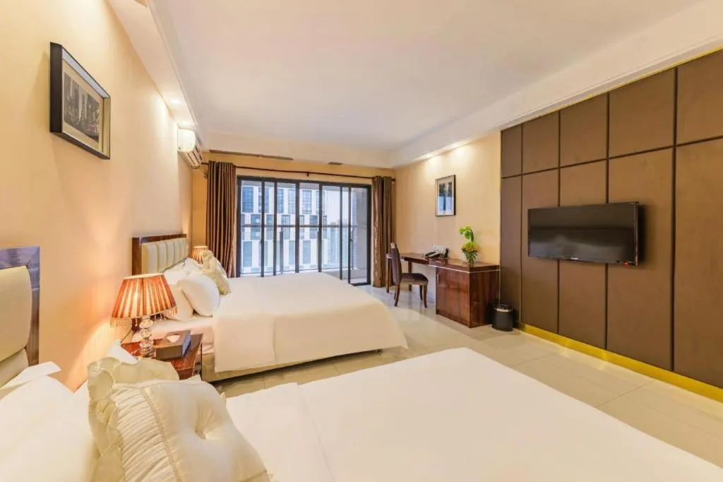 Bed in Foshan Baolong Hotel