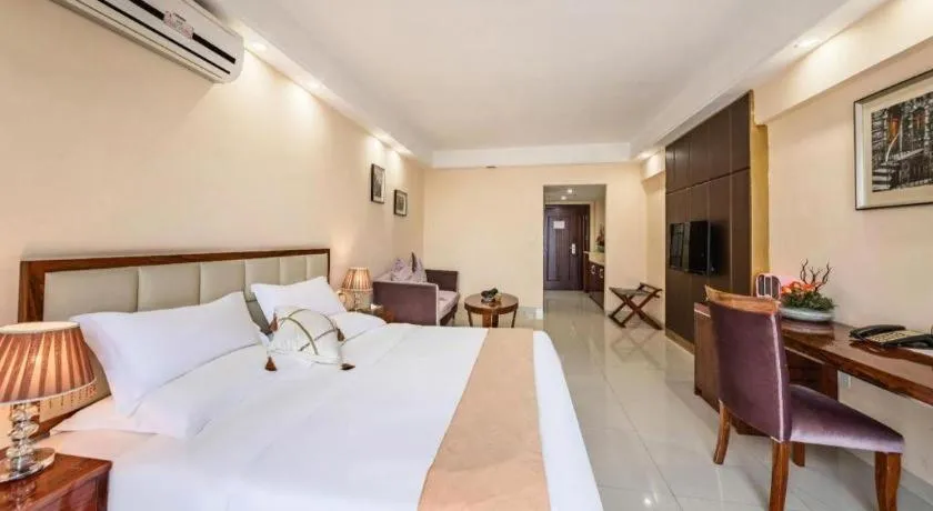 Bed in Foshan Baolong Hotel