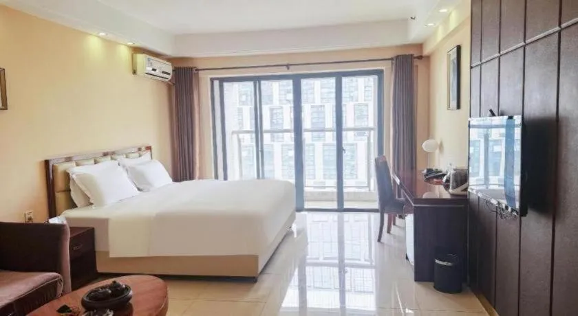 Bed in Foshan Baolong Hotel
