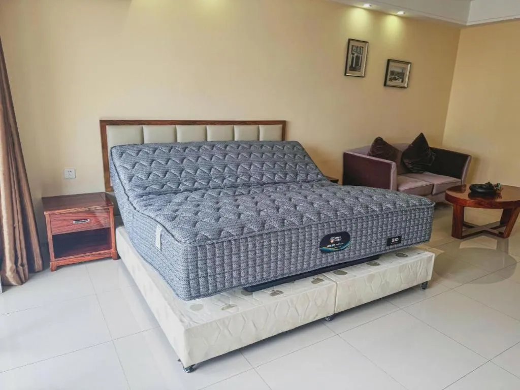 Bed in Foshan Baolong Hotel