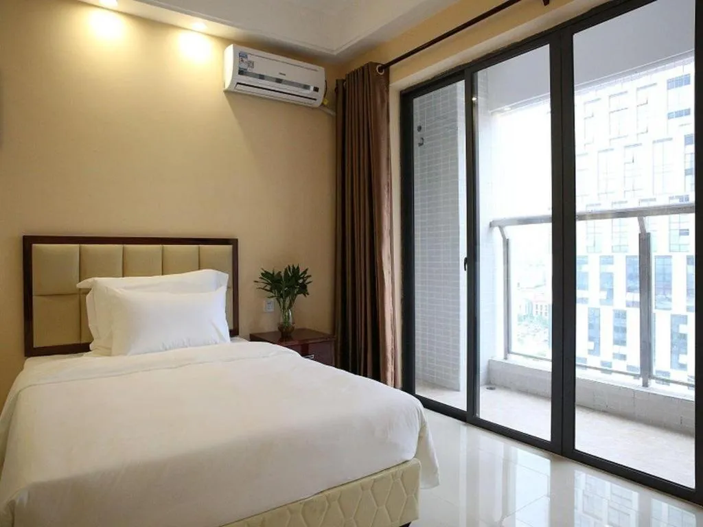 Bed in Foshan Baolong Hotel