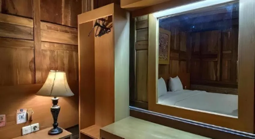 Bed in Parai Beach Resort Telengria