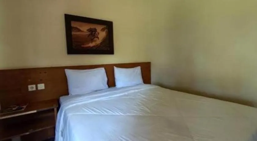 Bed in Parai Beach Resort Telengria
