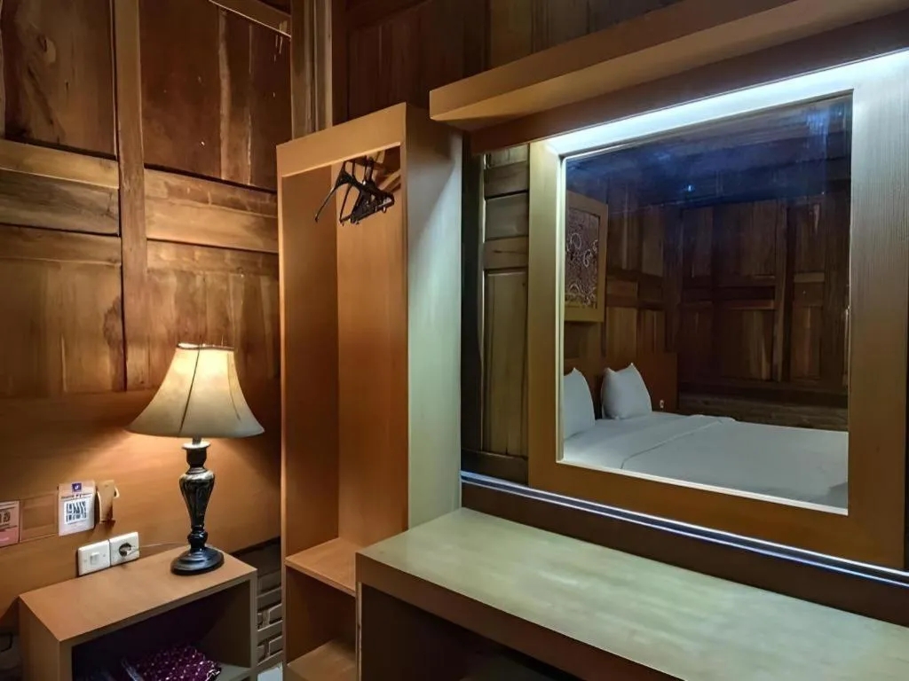 Bed in Parai Beach Resort Telengria