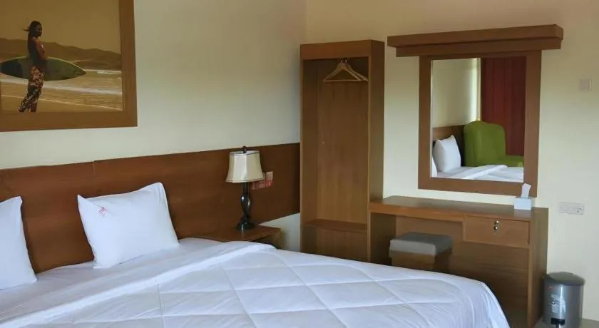 Bed in Parai Beach Resort Telengria