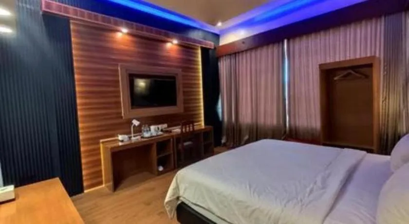 Bed in Parai Beach Resort Telengria