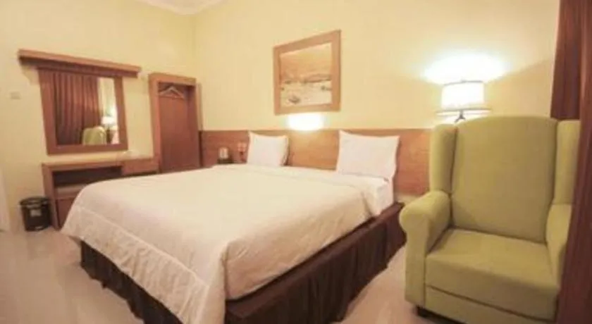 Bed in Parai Beach Resort Telengria