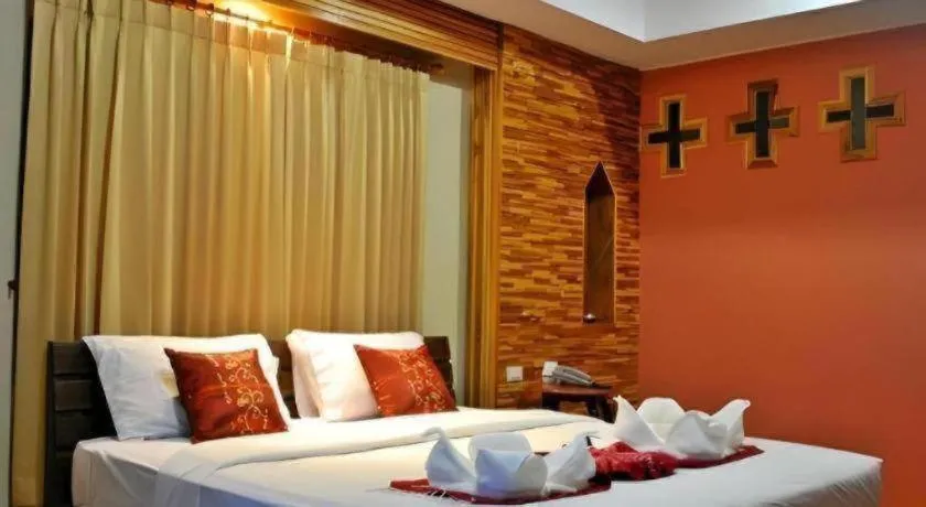 Bed in Oopkaew Resort