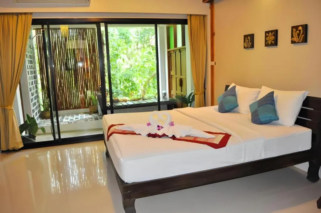 Bed in Oopkaew Resort