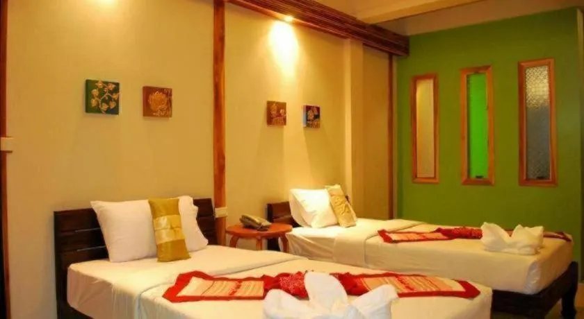 Bed in Oopkaew Resort