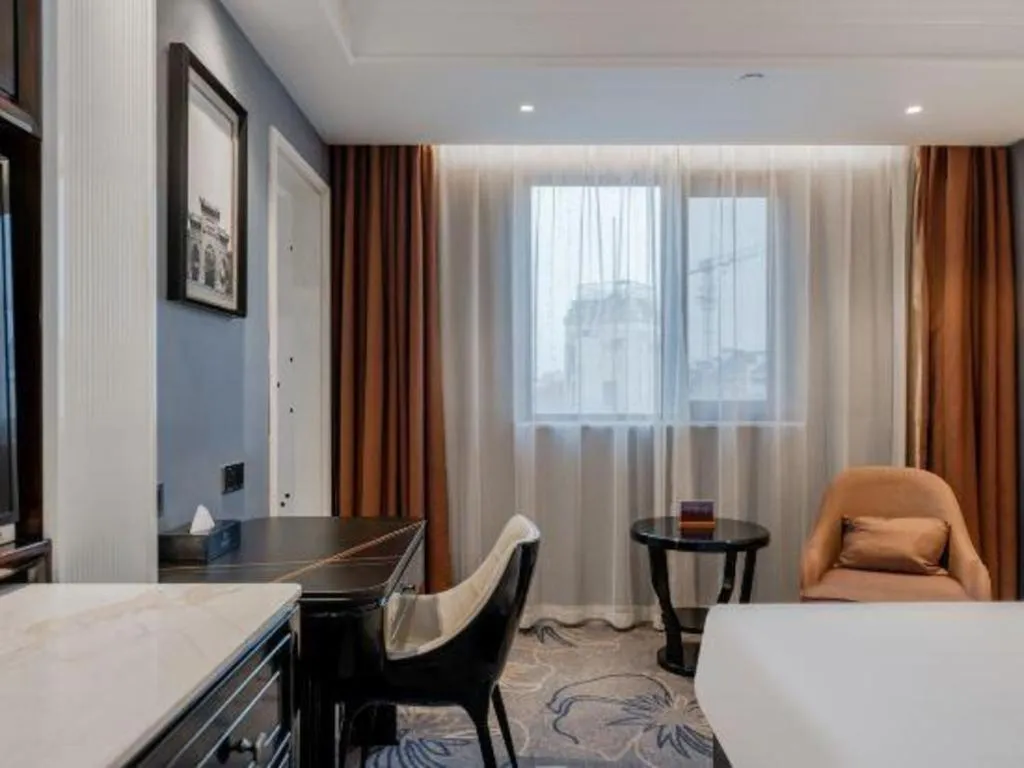 Bed in Jinjiang Metropolo Hotel Nanjing Confucius Temple Branch