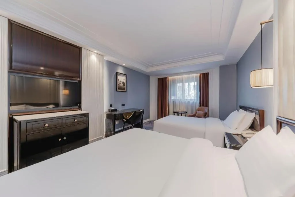 Bed in Jinjiang Metropolo Hotel Nanjing Confucius Temple Branch