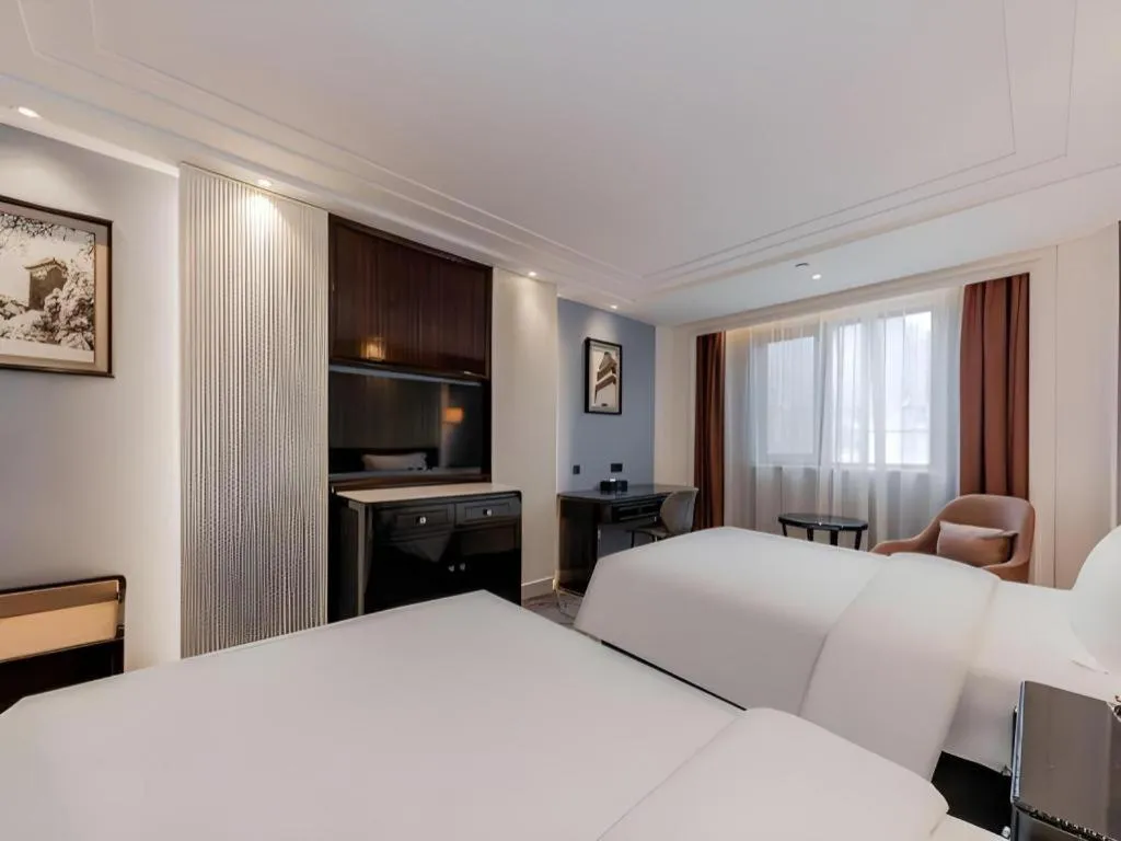 Bed in Jinjiang Metropolo Hotel Nanjing Confucius Temple Branch