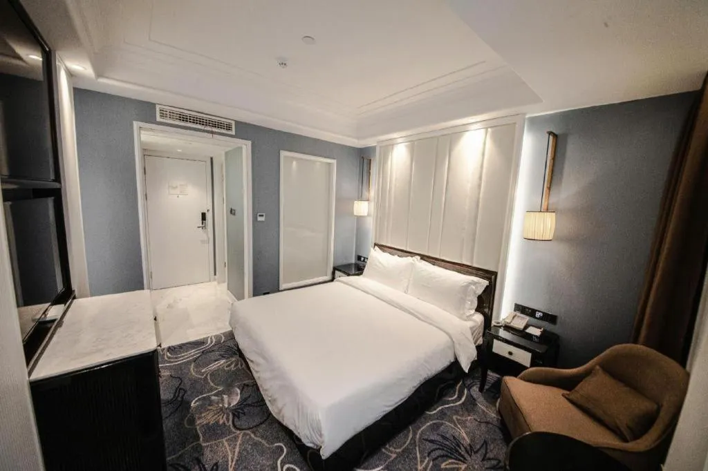 Bed in Jinjiang Metropolo Hotel Nanjing Confucius Temple Branch