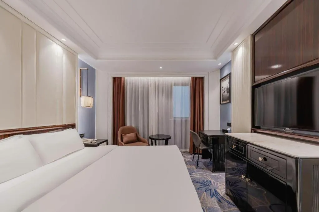 Bed in Jinjiang Metropolo Hotel Nanjing Confucius Temple Branch