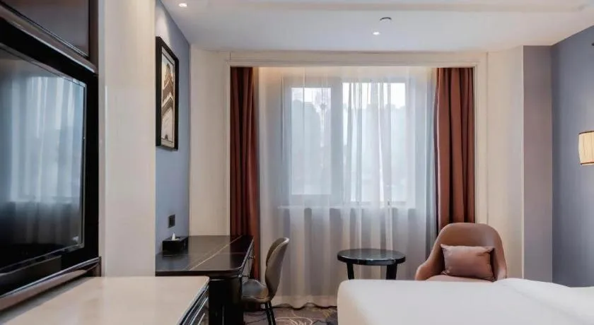 Bed in Jinjiang Metropolo Hotel Nanjing Confucius Temple Branch