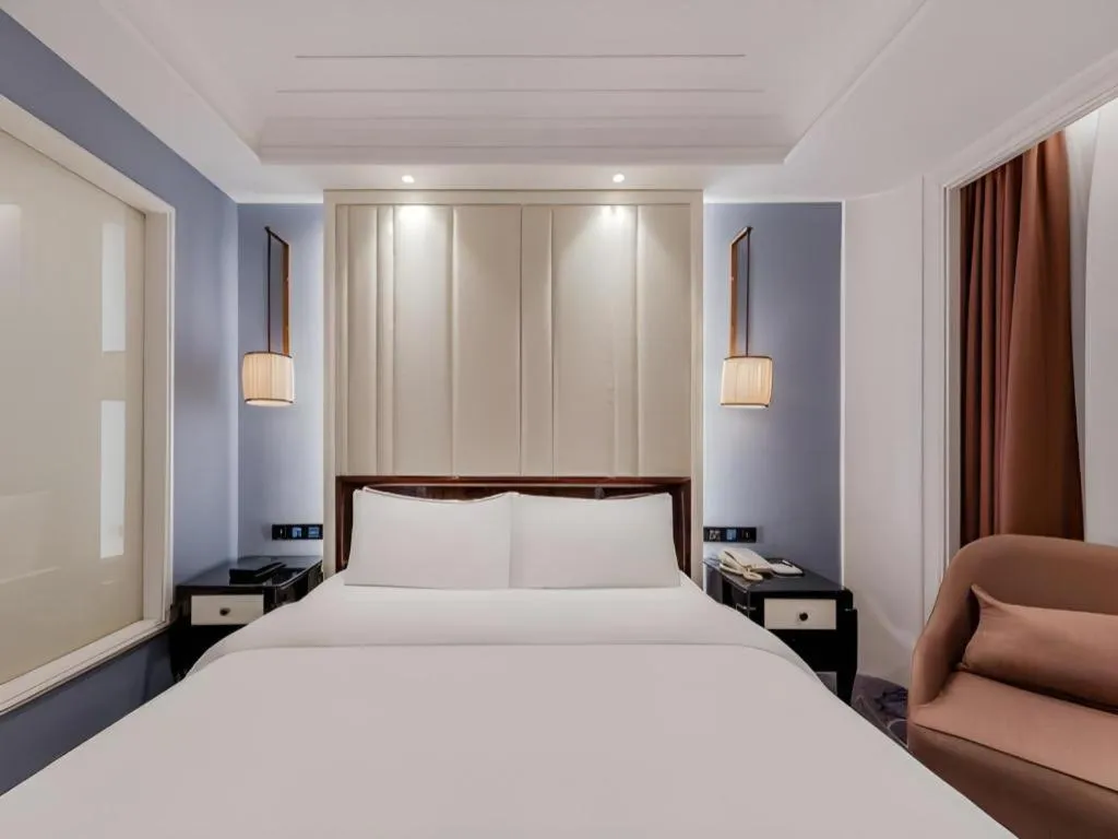 Bed in Jinjiang Metropolo Hotel Nanjing Confucius Temple Branch