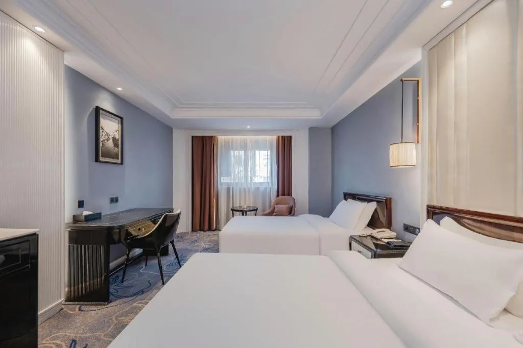 Bed in Jinjiang Metropolo Hotel Nanjing Confucius Temple Branch