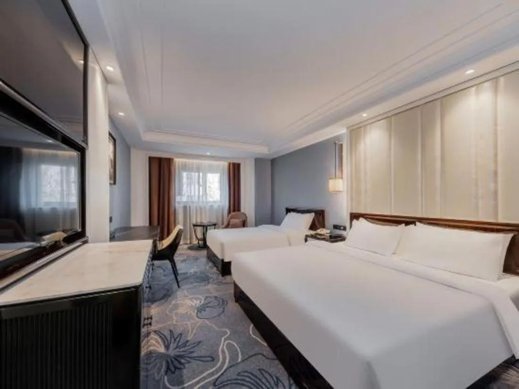 Bed in Jinjiang Metropolo Hotel Nanjing Confucius Temple Branch